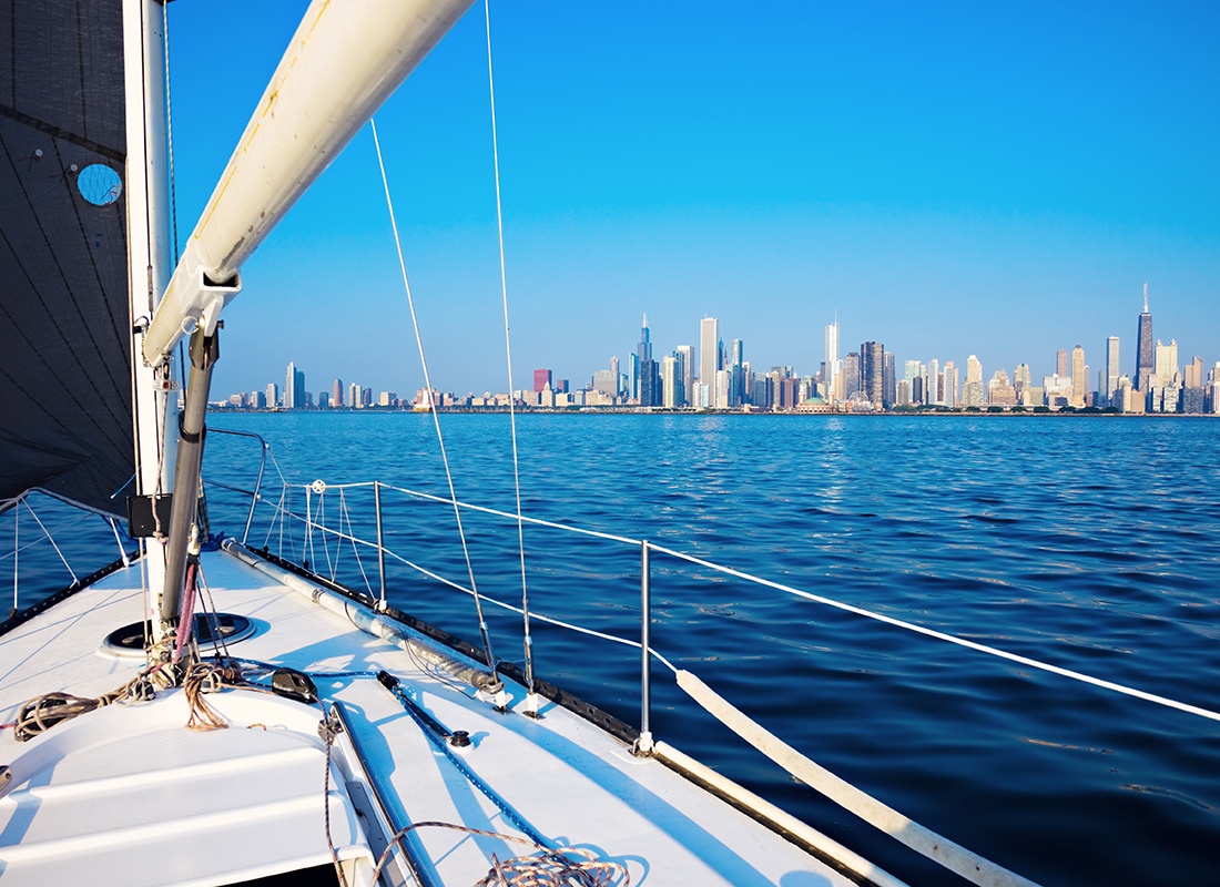 Contact - View of the Downtown Chicago Illinois Skyline Against a Clear Blue Sky from a Sailboat Out on Lake Michigan