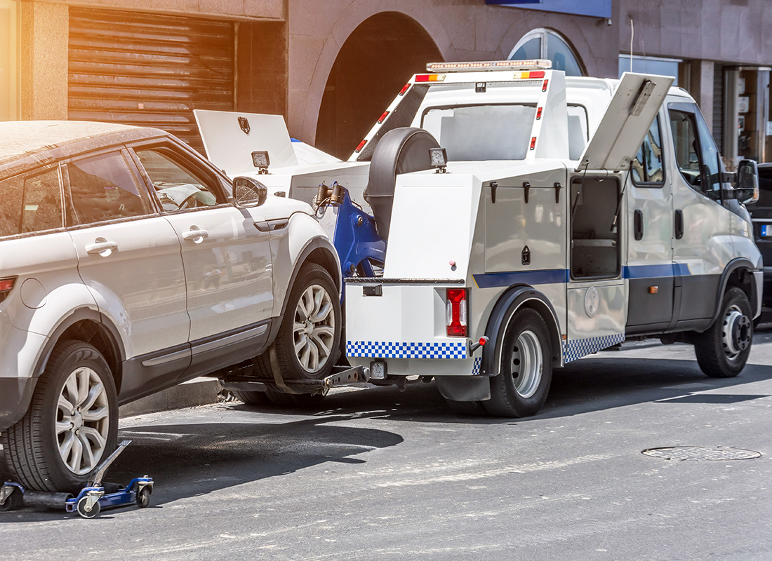 Do You Own a Towing Company? This is the Right Place for You! - Tow Truck Carrying a SUV